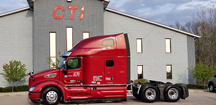CTI truck fleet in front of CTI office